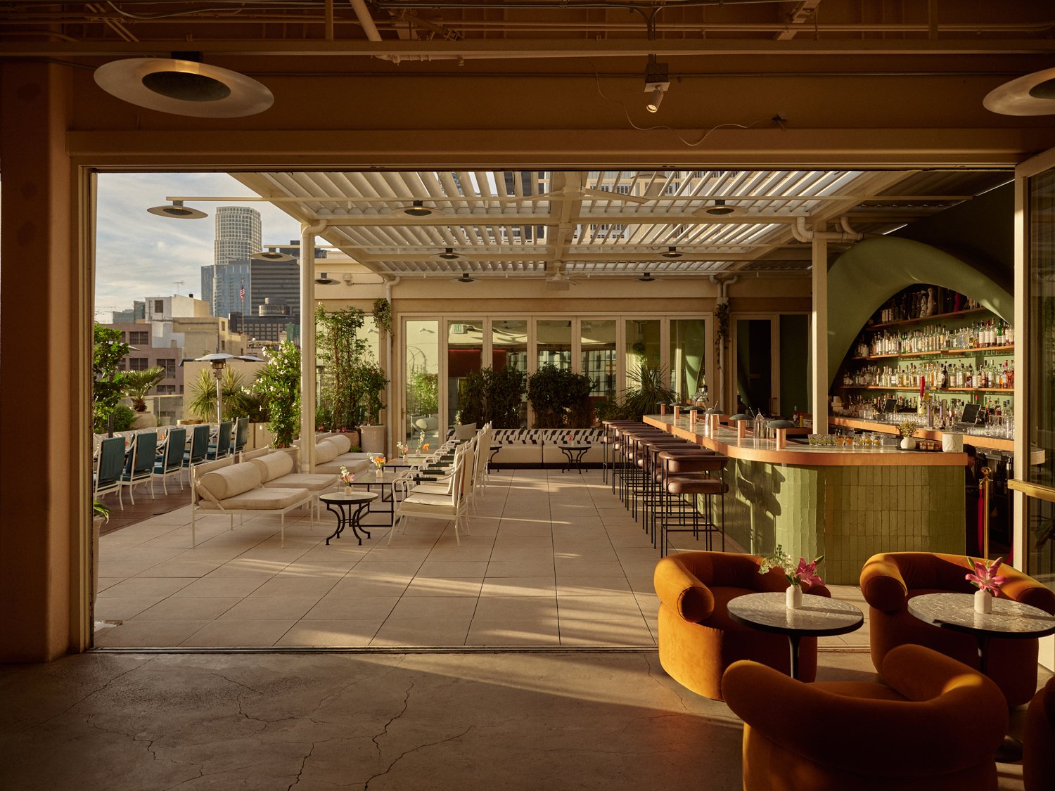 Florentín’s rooftop lounge and green bar in warm sunlight